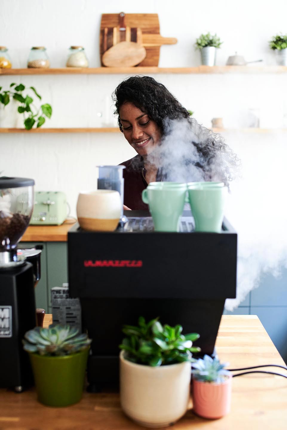 lifestyle photography for coffee roastery woman making coffee by London photographer Del Manning